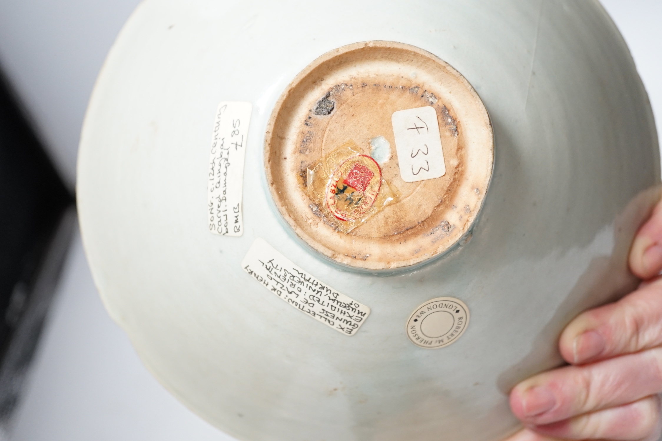 A Chinese incised Qingbai bowl, Song Dynasty and two green glazed Ming Dynasty pottery models of vessels, bowl 20cm diameter